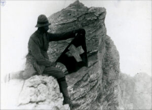 Early Mountaineer with Swiss Flag on Mount Olympus Summit